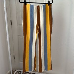 Brown, yellow, blue, and white stripe flare pants